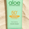 Two women at the beach applying Holika Holika Aloe Soothing Essence Sun Cream SPF50+