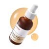 Ma:nyo Bifida Biome Complex Ampoule 50ml amber glass dropper bottle with golden serum texture swatches on white background