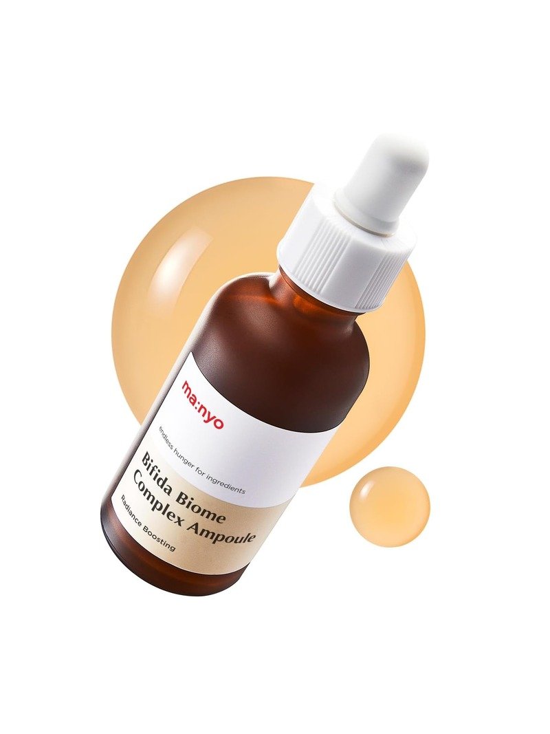 Ma:nyo Bifida Biome Complex Ampoule 50ml amber glass dropper bottle with golden serum texture swatches on white background
